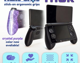 May include: Nano Grips THOR stick-on ergonomic grips for a handheld gaming console. The product features a crystal purple textured grip and a black grip attached to the device. Text includes Nano Grips THOR, stick-on ergonomic grips, and crystal purple color now available, plus icons for fit, comfort, texture, and design.