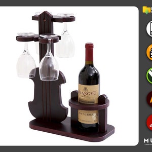May include: Wooden wine rack shaped like a violin with four glass holders and a bottle holder. The rack is dark brown and has a bottle of wine in the bottle holder. The wine bottle label says "Changyu".