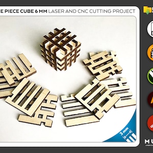 May include: Nine wooden pieces that can be assembled into a 6 mm cube. The pieces are laser cut and have a light brown color. The pieces are arranged in a circle around the assembled cube.