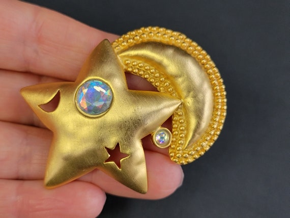 JJ brushed gold Star and moon brooch, A crystal s… - image 3