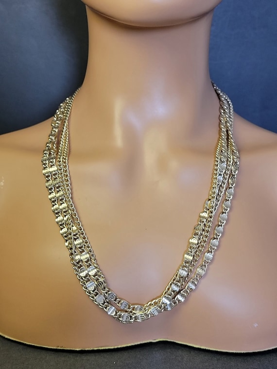 Gold multi snail chain necklace by Sarah Coventry,