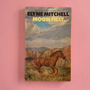 May include: A set of three ceramic mugs with a speckled, matte finish. The mugs are in shades of cream, light gray, and dark gray. Each mug has a simple, minimalist design, perfect for coffee or tea.