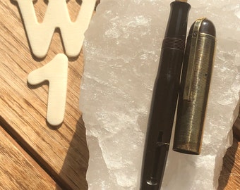 Pluma estilográfica vintage Eversharp Skyline, marrón y dorada