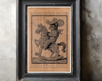 Cowboy Cat on Toy Horse Vintage Dictionary Art – Funny Western Rustic Wall Decor, Antique Style Illustration Poster