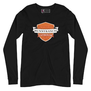 May include: Black long-sleeve t-shirt with an orange and white graphic of a shield with the text "Moonlite Bunnyranch CatHouse USA".
