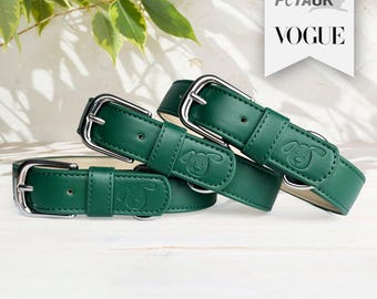 May include: Three green leather dog collars with silver buckles. Each collar has a small dog silhouette embossed on the leather. The collars are stacked on top of each other. The text "As featured in PetAUK VOGUE" is visible in the background.