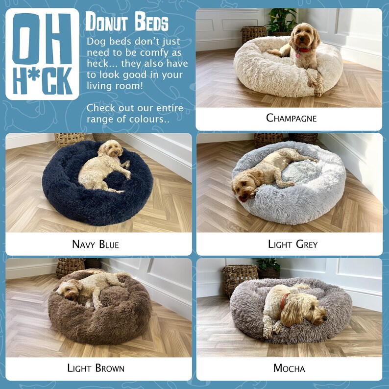 May include: A collection of donut-shaped dog beds in various colors, including champagne, navy blue, light grey, light brown, and mocha. Each bed features a fluffy, plush material and a dog resting comfortably inside.