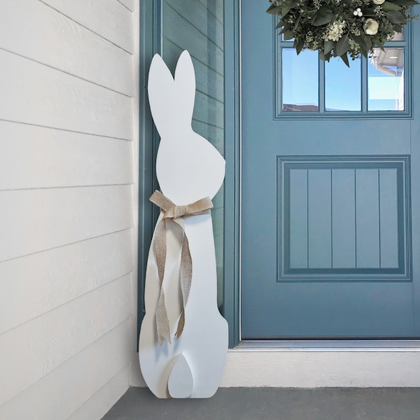 Large white porch leaner rabbit handcrafted from solid wood. Outdoor or indoor wooden spring decor. Tall sitting bunny with a burlap bow.