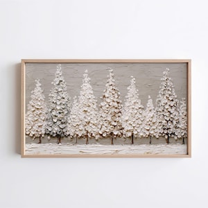 Puede incluir: Pintura enmarcada de una escena de bosque invernal. La obra presenta árboles blancos texturizados con troncos marrones sobre un fondo gris. La pintura está enmarcada en un marco de madera marrón claro.