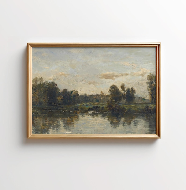 May include: A framed painting depicting a landscape scene with a river, trees, and a cloudy sky. The painting is done in a muted palette of browns, greens, and blues.