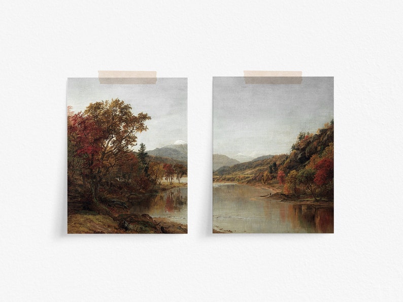 May include: Two paintings of a river scene with fall foliage. The left painting shows a river with a large tree on the bank. The right painting shows a river with a mountain range in the background.