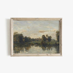 May include: A framed painting depicting a tranquil landscape with a river reflecting the cloudy sky. Lush green trees line the riverbanks, creating a serene and picturesque scene.