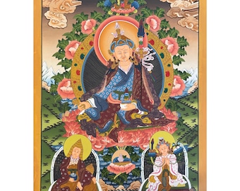 Puede incluir: Una vibrante pintura enmarcada que representa una figura sentada con ropas ornamentadas, rodeada por un halo dorado y flores de loto. La obra de arte presenta pinceladas detalladas, colores ricos y figuras adicionales en la parte inferior.