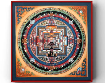 May include: A square, framed artwork featuring a detailed mandala design. The artwork has a red frame, a dark blue border, and a central design with intricate patterns in red, blue, orange, and white. The mandala is a complex, symmetrical composition.