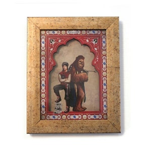 May include: A framed illustration of a man and a large furry creature standing together. The illustration is set within a red and gold ornate frame with a decorative archway. The man is wearing a brown tunic and pants, and the creature is brown and furry with a long tail.