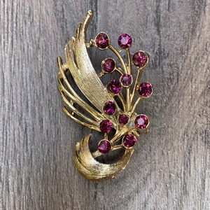 Vintage Floral Gold Tone Brooch with Purple Stones