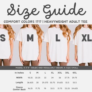 May include: Size guide for Comfort Colors 1717 heavyweight adult tee shirts. The image shows four models wearing different sizes: S, M, L, and XL. Measurements in inches are provided for width, length, and sleeve center back for each size, up to 4XL.