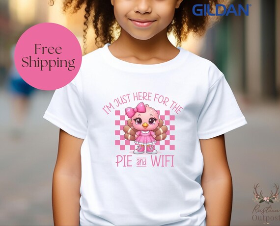 Bonita camiseta para niña con diseño de pastel de Acción de