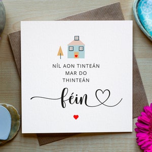 There's No Place Like Home, Irish-language card , 'Níl aon tinteán', Gaeilge card.