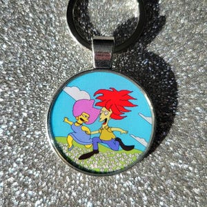 Romping Sideshow Bob and Selma Black Widower Simpsons Pendant Keychain