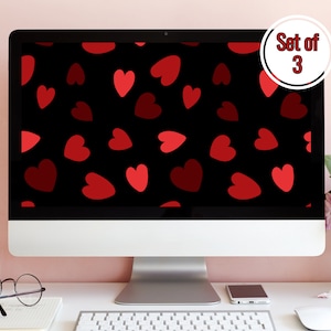 May include: A computer screen displaying a digital wallpaper with a repeating pattern of red hearts on a black background. The text "Set of 3" is visible in a white circle in the upper right corner of the screen.