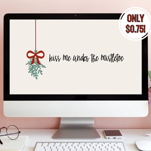May include: A computer monitor displaying a cream-colored background with a graphic of green mistletoe tied with a red ribbon and the black text "kiss me under the mistletoe". A circular badge in the top right corner displays the text "ONLY $0.75!".