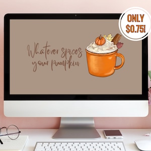 May include: A computer monitor displaying a digital graphic on a tan background. The graphic features an orange mug filled with whipped cream, a small pumpkin, and a cinnamon stick, with the text Whatever spices your pumpkin written in brown.
