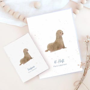 Personalisierte Hülle für U-Heft, Impfpass/Reisepass mit Robbe als Geschenk zur Geburt, Babyparty mit Fach für Impfpass und Gesundheitskarte