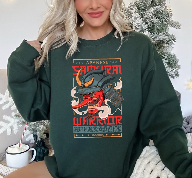 a woman wearing a green sweatshirt with a dragon on it