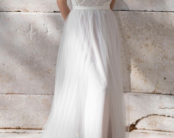 Detachable overskirt made of floaty tulle with slit in front skirt and bow in back - Scilla Overskirt