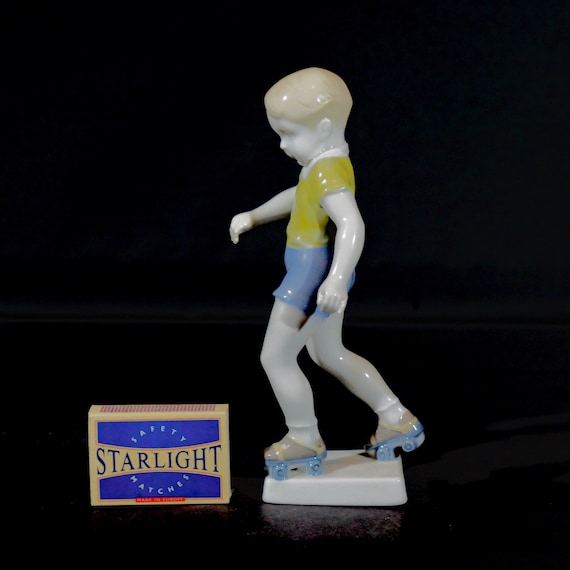 Roller skating boy in porcelain