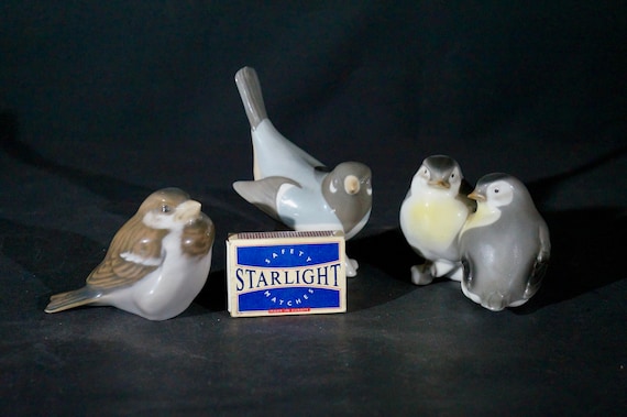 Three old porcelain birds