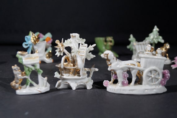 Small collection miniature porcelain statuettes