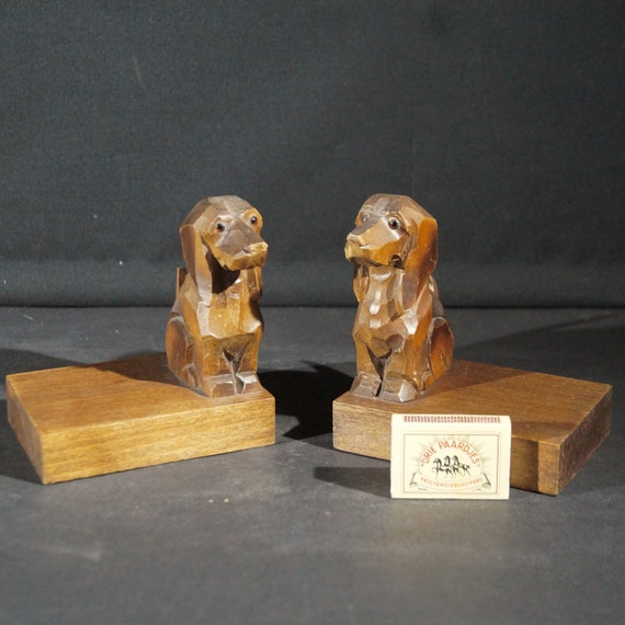 Old book stands of two teckle dogs