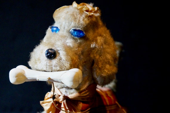 Afstand bestuurbaar hondje uit de 50er jaren