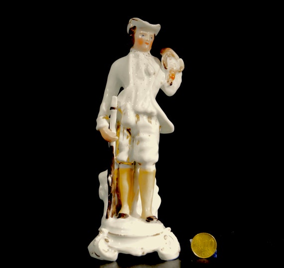Staffordshire hunter figurine with partridge. Ceramic, Collectable, hand painted,
