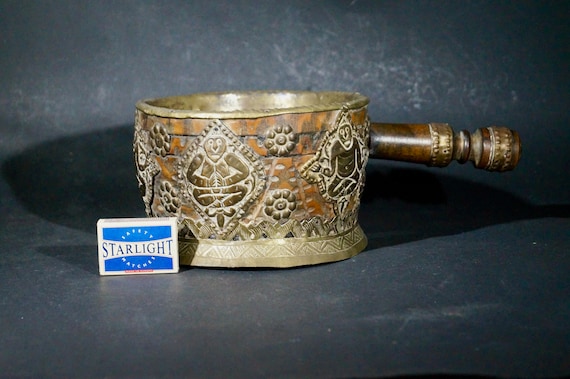 Nepalese artwork wood and copper.