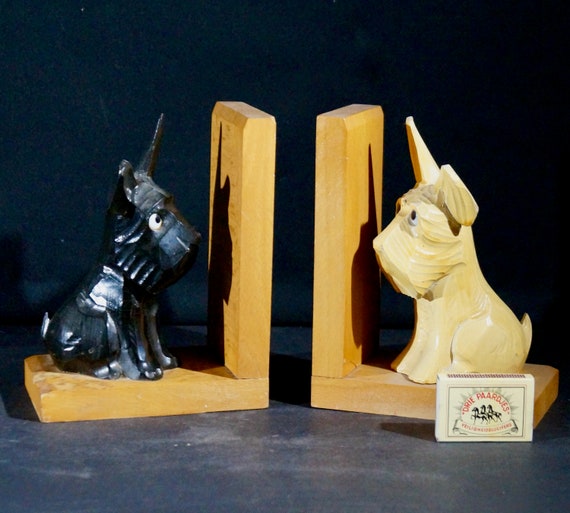 Old book stands of black and white Scottie dogs