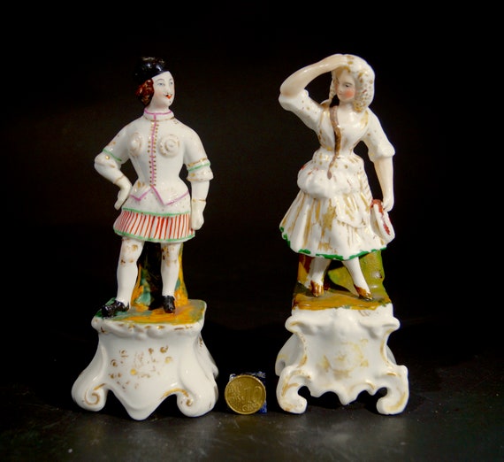 Staffordshire pair of white and gold and orange figurines. Ceramic, Collectable, hand painted,