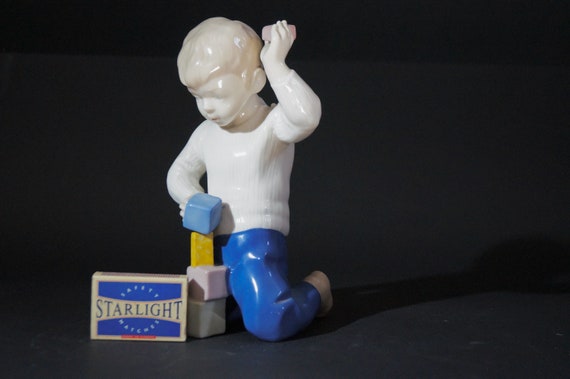 Boy with toy. Figurine. Vintage. Ceramic, Collectible, hand painted,