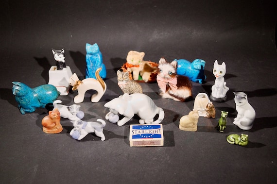 Collection of small cat statuettes 18x