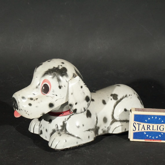 Tin toy dog black and white