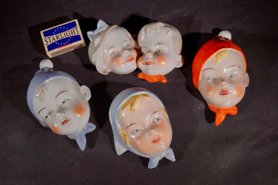 Boy's and girl's porcelain portraits. Sweetest in the world.