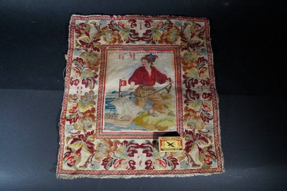 Hand embroidered cotton shield decoration