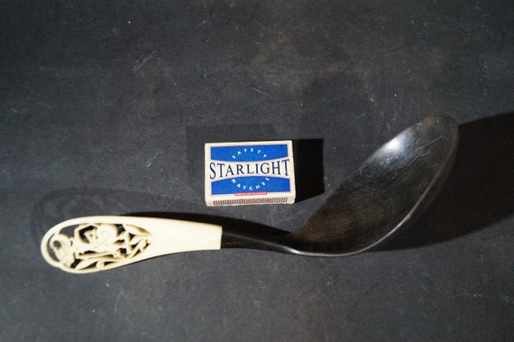 Bone spoon from Java black and white