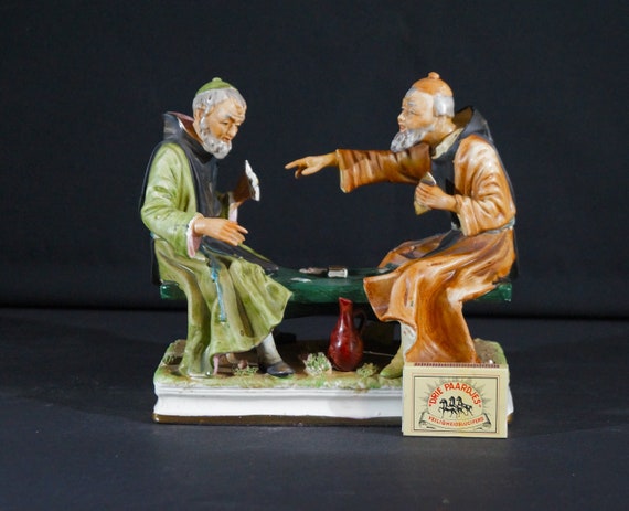 Two monks playing a card game. Great figurine MEITO