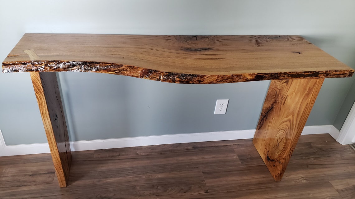 Handmade live edge red oak table with 4 maple bowties inlaid. Etsy