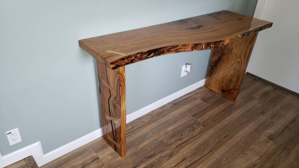 Handmade live edge red oak table with 4 maple bowties inlaid. Etsy