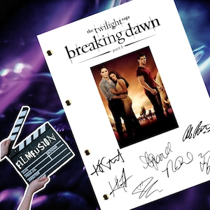 May include: A white script for "The Twilight Saga: Breaking Dawn - Part 1" with a movie poster image and signatures. A film clapperboard is held in the lower left corner. The background is a purple and blue gradient.