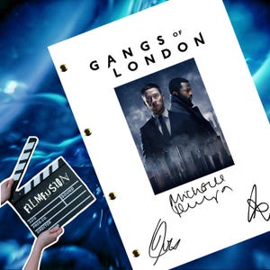 May include: A white script for the film "Gangs of London" with a black and white photo of two men in suits. The script is signed by the actors "Micheal  Pena" and "Joe Cole".